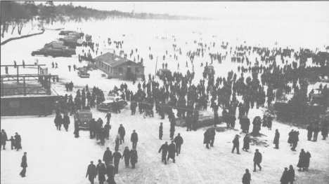 Paul Bunyan Winter Carnival of 1937 with crowds of Civil Conservation Corps men. 