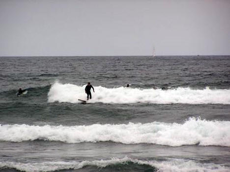 Surfers getting rides on Stony Point near Knife River Minnesota, 2009