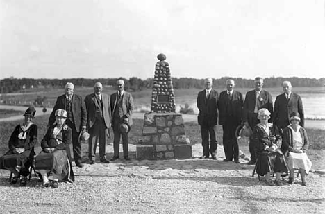 Monument erected at Parkers Prairie commemorating first settlers, 1930