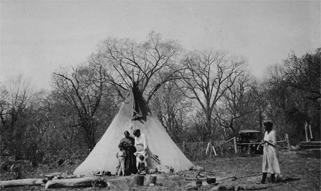 Tipi summer home of John Jones, Red Lake Minnesota, 1922