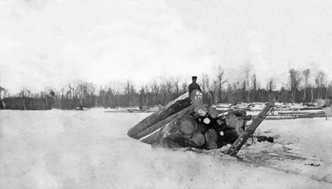 Load of logs that fell through the ice, Akeley Minnesota, 1900