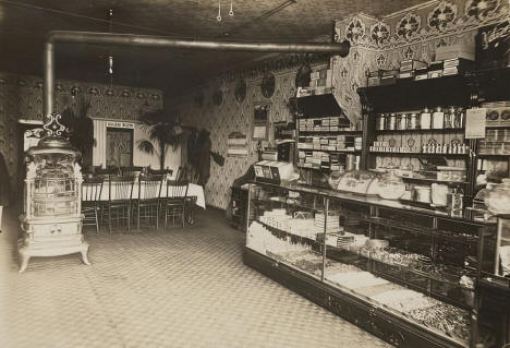 Interior view of the restaurant owned by Irving Empey, Olivia Minnesota, 1910