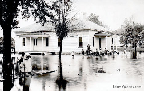 Children playing in flood waters, Waseca Minnesota, 1910s